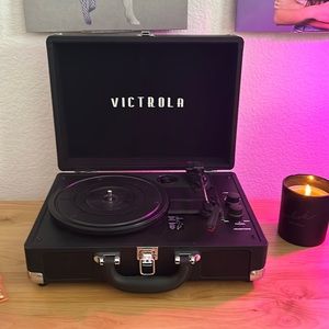 victoria record player- has speakers built in, also has bluetooth